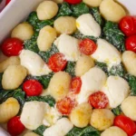Gnocchi Auflauf mit Spinat, Tomate und Mozzarella